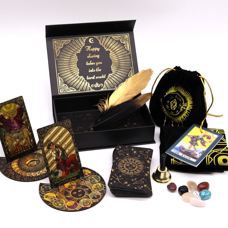 Contents of the gold foil tarot gift set laid out