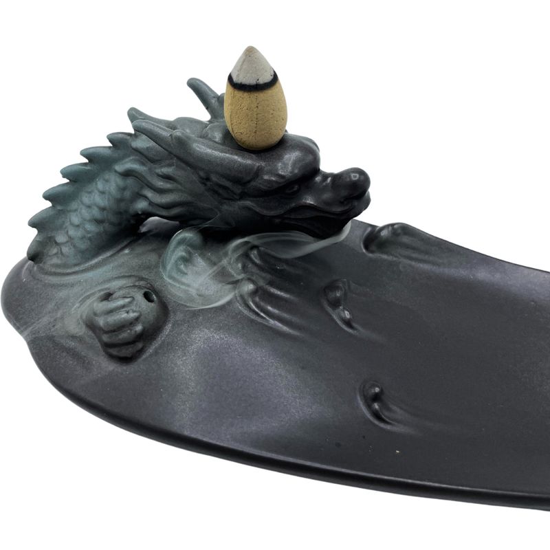 Backflow smoke pooling around the dragon
